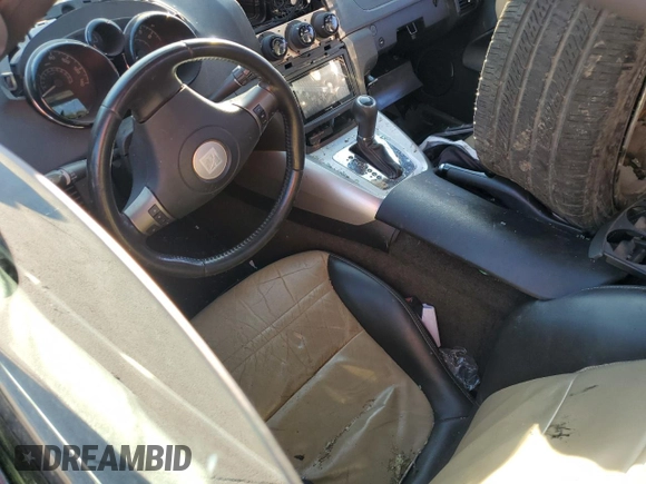 2007 Saturn Sky z VIN 1G8MB33B67Y100006, wystawiony jako Copart lot #46546375 z przebiegiem Nie podano mil oraz Szkody całkowita. Historia ofert i sprzedaży dostępna na DreamBid. Obrazek 8.
