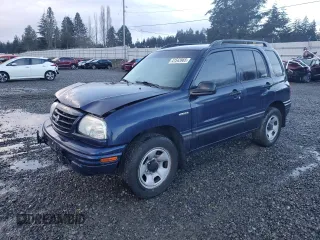 2001 Suzuki Vitara JX z VIN 2S3TD52V916109753, wystawiony jako Copart lot #41543965 z przebiegiem 102 720 mil mil oraz Szkody całkowita. Historia ofert i sprzedaży dostępna na DreamBid. Obrazek 1.