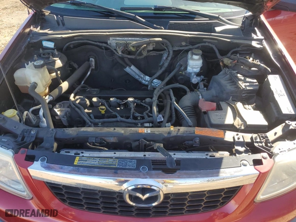 2010 Mazda Tribute Touring with VIN 4F2CY9C77AKM04941, listed as a Copart auction lot 50802955 with 118,480 mi miles and Salvage Title. Bid and sale history available at carsss.com. Image 13.