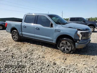 2023 Ford F-150 Lightning Pro с VIN 1FT6W1EV1PWG53186, выставлен на аукционе Copart как лот 52423485 с пробегом 23 518 миль миль и Списание • Salvage title. История ставок и продаж доступна на DreamBid. Изображение 4.