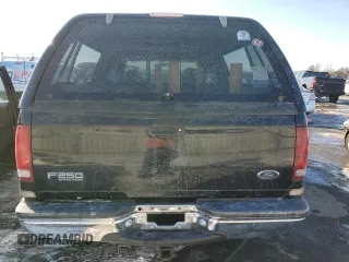 1999 Ford F-250 XL with VIN 1FTNX21L7XED97757, listed as a Copart auction lot 42296985 with 168,728 mi miles and Salvage title. Bid and sale history available at DreamBid. Image 6.