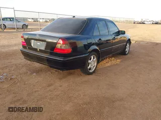 2000 Mercedes-Benz C 230 Kompressor with VIN WDBHA24G4YA838524, listed as a IAAI auction lot 41582117 with Not Provided miles and . Bid and sale history available at carsss.com. Image 4.