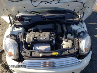 2012 MINI Convertible с VIN WMWZN3C52CT133828, выставлен на аукционе Copart как лот 89387935 с пробегом 106 567 миль миль и Списание • Salvage title. История ставок и продаж доступна на DreamBid. Изображение 11.