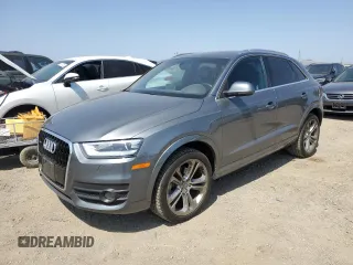 2015 Audi Q3 Prestige with VIN WA1GFCFS8FR009731, listed as a Copart auction lot 59897225 with 84,138 mi miles and Salvage title. Bid and sale history available at DreamBid. Image 1.
