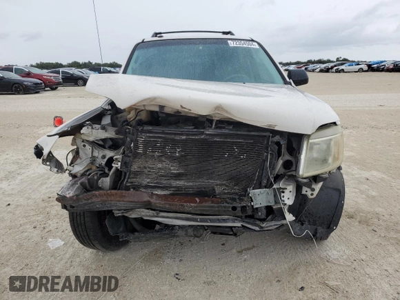 2009 Mercury Mariner with VIN 4M2CU81G49KJ16972, listed as a Copart auction lot 72354504 with 148,966 mi miles and Salvage title. Bid and sale history available at DreamBid. Image 5.