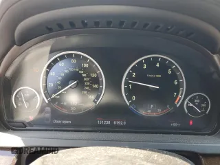 2013 BMW 7 Series 750i with VIN WBAYA8C58DC996865, listed as a Copart auction lot 61831294 with 151,238 mi miles and Salvage Title. Bid and sale history available at DreamBid. Image 9.