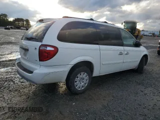 2006 Chrysler Town & Country LWB LX with VIN 2A4GP44R26R665808, listed as a Copart auction lot 87376894 with 214,666 mi miles and Salvage Title. Bid and sale history available at carsss.com. Image 3.