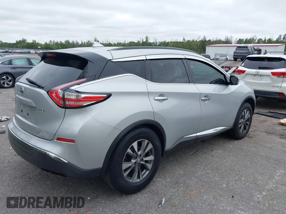 2018 Nissan Murano SV with VIN 5N1AZ2MGXJN138318, listed as a IAAI auction lot 41332561 with 104,067 mi miles and . Bid and sale history available at DreamBid. Image 4.