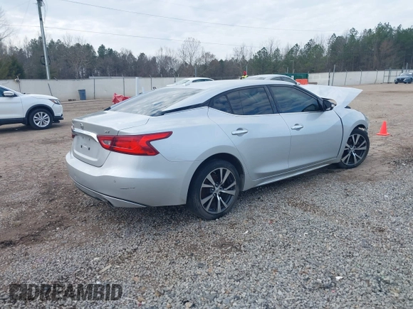 2016 Nissan Maxima SV with VIN 1N4AA6AP7GC439288, listed as a IAAI auction lot 41572262 with 223,185 mi miles and . Bid and sale history available at DreamBid. Image 4.