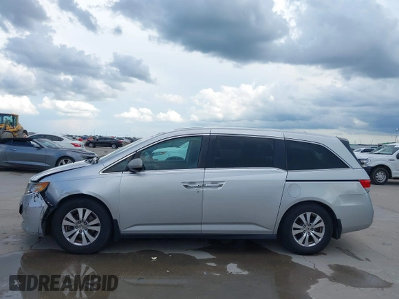 2014 Honda Odyssey EX-L with VIN 5FNRL5H60EB058753, listed as a IAAI auction lot 42595221 with 194,995 mi miles and . Bid and sale history available at DreamBid. Image 14.