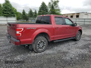 2019 Ford F-150 XL with VIN 1FTEW1E5XKFD24698, listed as a Copart auction lot 60204085 with 145,406 mi miles and Salvage title. Bid and sale history available at DreamBid. Image 3.