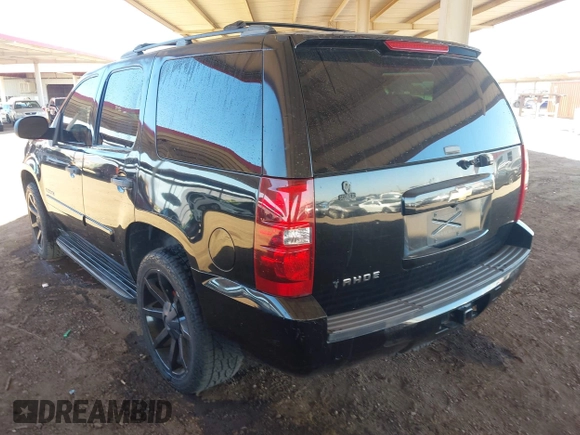 2007 Chevrolet Tahoe LS with VIN 1GNFC13C07J400472, listed as a IAAI auction lot 42209311 with 212,924 mi miles and . Bid and sale history available at DreamBid. Image 3.
