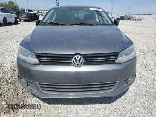 2012 Volkswagen Jetta TDI w/Premium & Nav z VIN 3VWLL7AJ2CM358901, wystawiony jako Copart lot #57350505 z przebiegiem 155 062 mil mil oraz Szkoda całkowita • Salvage title. Historia ofert i sprzedaży dostępna na DreamBid. Obrazek 5.