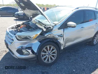 2018 Ford Escape Titanium with VIN 1FMCU9J96JUA33500, listed as a IAAI auction lot 42121736 with 105,430 mi miles and . Bid and sale history available at DreamBid. Image 6.