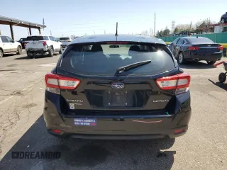 2018 Subaru Impreza z VIN 4S3GTAA61J3720731, wystawiony jako Copart lot #52864575 z przebiegiem 74 634 mil mil oraz Szkoda całkowita • Salvage title. Historia ofert i sprzedaży dostępna na DreamBid. Obrazek 6.