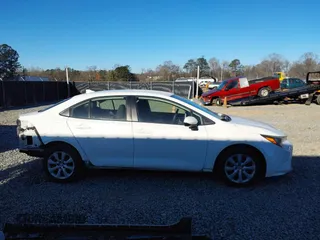 2021 Toyota Corolla LE with VIN JTDEPMAE9MJ118938, listed as a IAAI auction lot 41152722 with 107,911 mi miles. Bid and sale history available at carsss.com. Image 14.