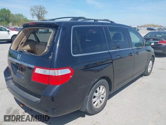 2007 Honda Odyssey Touring with VIN 5FNRL38847B092669, listed as a IAAI auction lot 42220313 with 177,789 mi miles and . Bid and sale history available at DreamBid. Image 4.