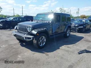 2022 Jeep Wrangler Unlimited Sahara with VIN 1C4HJXEN2NW194502, listed as a IAAI auction lot 42002455 with 34,861 mi miles and . Bid and sale history available at DreamBid. Image 17.