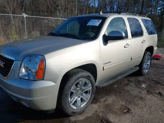 2014 GMC Yukon SLT with VIN 1GKS1CE03ER115330, listed as a IAAI auction lot 41346200 with 115,010 mi miles. Bid and sale history available at carsss.com. Image 18.