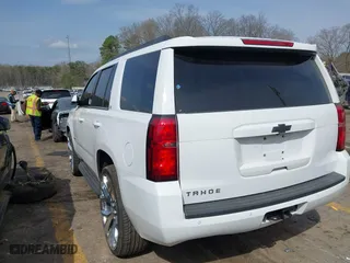 2019 Chevrolet Tahoe LT with VIN 1GNSCBKC6KR345154, listed as a IAAI auction lot 41808536 with 124,325 mi miles. Bid and sale history available at carsss.com. Image 3.