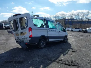 2018 Ford Transit Passenger XL with VIN 1FMZK1CM0JKB21599, listed as a IAAI auction lot 41511852 with Not provided miles and . Bid and sale history available at DreamBid. Image 4.