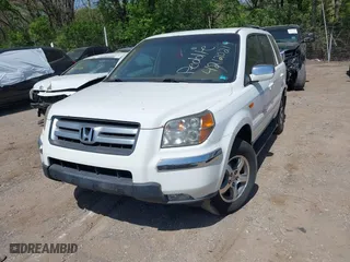 2007 Honda Pilot EX-L with VIN 5FNYF18567B032406, listed as a IAAI auction lot 42120219 with 205,687 mi miles. Bid and sale history available at carsss.com. Image 2.