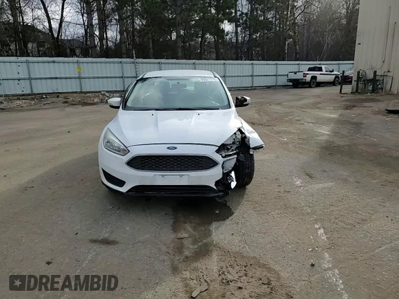 2015 Ford Focus SE z VIN 1FADP3F20FL241951, wystawiony jako Copart lot #89021775 z przebiegiem 91 698 mil mil oraz Szkoda całkowita • Salvage title. Historia ofert i sprzedaży dostępna na DreamBid. Obrazek 11.