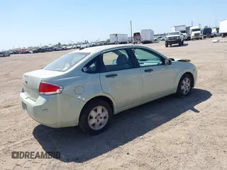 2010 Ford Focus S with VIN 1FAHP3EN9AW118413, listed as a IAAI auction lot 41765103 with 157,131 mi miles. Bid and sale history available at carsss.com. Image 4.