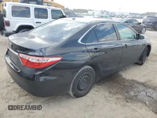 2015 Toyota Camry LE with VIN 4T1BD1FK7FU142189, listed as a Copart auction lot 66600314 with 194,969 mi miles and Salvage Title. Bid and sale history available at DreamBid. Image 3.
