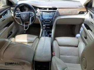 2014 Cadillac XTS Luxury z VIN 2G61M5S38E9215641, wystawiony jako Copart lot #53188695 z przebiegiem 97 431 mil mil oraz Szkody całkowita. Historia ofert i sprzedaży dostępna na DreamBid. Obrazek 8.