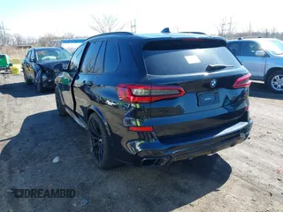 2019 BMW X5 xDrive50i with VIN 5UXJU2C5XKLN66873, listed as a IAAI auction lot 41472246 with 98,571 mi miles. Bid and sale history available at carsss.com. Image 3.