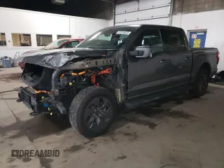2022 Ford F-150 Lightning Pro z VIN 1FT6W1EV7NWG10033, wystawiony jako Copart lot #81516533 z przebiegiem 11 282 mil mil oraz Szkody całkowita. Historia ofert i sprzedaży dostępna na DreamBid. Obrazek 1.