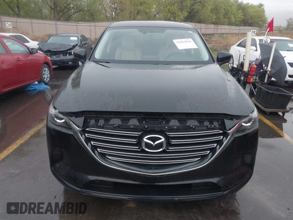 2016 Mazda CX-9 Touring with VIN JM3TCBCY5G0101490, listed as a IAAI auction lot 42062846 with 85,352 mi miles and . Bid and sale history available at DreamBid. Image 12.