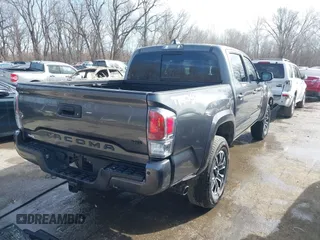 2021 Toyota Tacoma SR z VIN 3TMCZ5AN0MM392247, wystawiony jako IAAI lot #41645989 z przebiegiem 48 029 mil mil oraz . Historia ofert i sprzedaży dostępna na DreamBid. Obrazek 4.