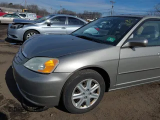 2003 Honda Civic EX with VIN 2HGES26733H626191, listed as a IAAI auction lot 41623055 with 107,125 mi miles and . Bid and sale history available at DreamBid. Image 17.