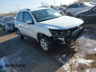 2016 Volkswagen Tiguan SE with VIN WVGBV7AX0GW018760, listed as a IAAI auction lot 41733586 with 60,743 mi miles and . Bid and sale history available at DreamBid. Image 1.