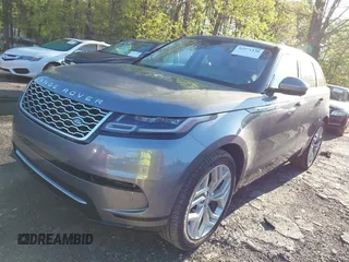2020 Land Rover Range Rover Velar S z VIN SALYB2EXXLA295307, wystawiony jako IAAI lot #41971330 z przebiegiem 12 192 mil mil oraz . Historia ofert i sprzedaży dostępna na DreamBid. Obrazek 18.