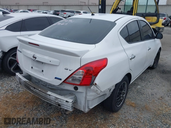 2014 Nissan Versa SV with VIN 3N1CN7AP0EL869083, listed as a IAAI auction lot 42044279 with 143,568 mi miles. Bid and sale history available at carsss.com. Image 4.