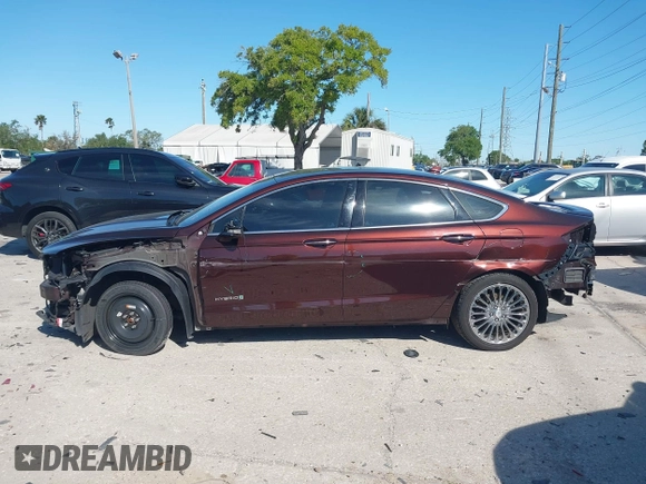 2019 Ford Fusion Hybrid Titanium with VIN 3FA6P0RU2KR123786, listed as a IAAI auction lot 41857026 with 49,604 mi miles. Bid and sale history available at carsss.com. Image 15.