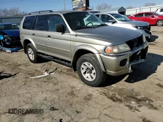2002 Mitsubishi Montero XLS z VIN JA4MT31R22J009216, wystawiony jako Copart lot #42943735 z przebiegiem 190 168 mil mil oraz Szkoda całkowita • Salvage title. Historia ofert i sprzedaży dostępna na DreamBid. Obrazek 12.