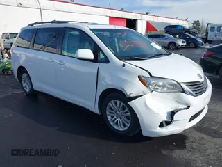 2012 Toyota Sienna XLE AAS with VIN 5TDYK3DC7CS267673, listed as a IAAI auction lot 41493549 with 176,845 mi miles. Bid and sale history available at carsss.com. Image 1.