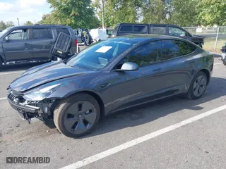 2023 Tesla Model 3 with VIN 5YJ3E1EA6PF701109, listed as a IAAI auction lot 40491628 with 9,989 mi miles. Bid and sale history available at carsss.com. Image 20.