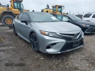 2018 Toyota Camry XSE with VIN 4T1BZ1HK9JU001115, listed as a IAAI auction lot 41958365 with 121,021 mi miles and . Bid and sale history available at DreamBid. Image 1.