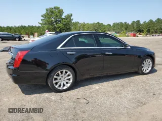 2015 Cadillac CTS Luxury RWD with VIN 1G6AR5SX2F0115311, listed as a Copart auction lot 58944915 with 34,764 mi miles and Salvage title. Bid and sale history available at DreamBid. Image 3.