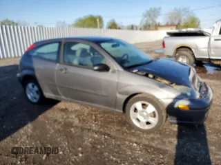 2004 Ford Focus z VIN 3FAFP31Z24R125730, wystawiony jako Copart lot #55257835 z przebiegiem 100 813 mil mil oraz Szkody całkowita. Historia ofert i sprzedaży dostępna na DreamBid. Obrazek 4.