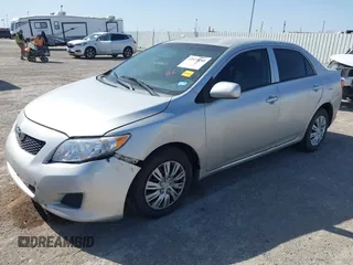 2010 Toyota Corolla with VIN JTDBU4EE1AJ069302, listed as a IAAI auction lot 41854288 with 196,844 mi miles. Bid and sale history available at carsss.com. Image 2.