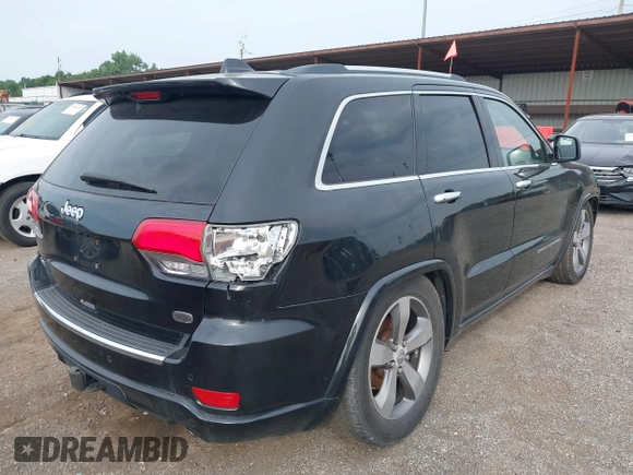 2015 Jeep Grand Cherokee High Altitude with VIN 1C4RJFCGXFC604663, listed as a IAAI auction lot 42816306 with 117,467 mi miles and . Bid and sale history available at DreamBid. Image 4.