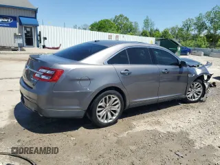 2013 Ford Taurus Limited with VIN 1FAHP2F85DG225363, listed as a Copart auction lot 56127255 with 128,660 mi miles and Salvage title. Bid and sale history available at DreamBid. Image 3.