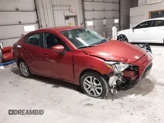 2016 Scion iA z VIN 3MYDLBZV9GY123638, wystawiony jako IAAI lot #41672722 z przebiegiem 88 896 mil mil oraz . Historia ofert i sprzedaży dostępna na DreamBid. Obrazek 1.