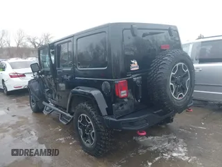 2015 Jeep Wrangler Unlimited Rubicon Hard Rock with VIN 1C4HJWFG9FL569962, listed as a IAAI auction lot 41557801 with 78,597 mi miles and . Bid and sale history available at DreamBid. Image 3.
